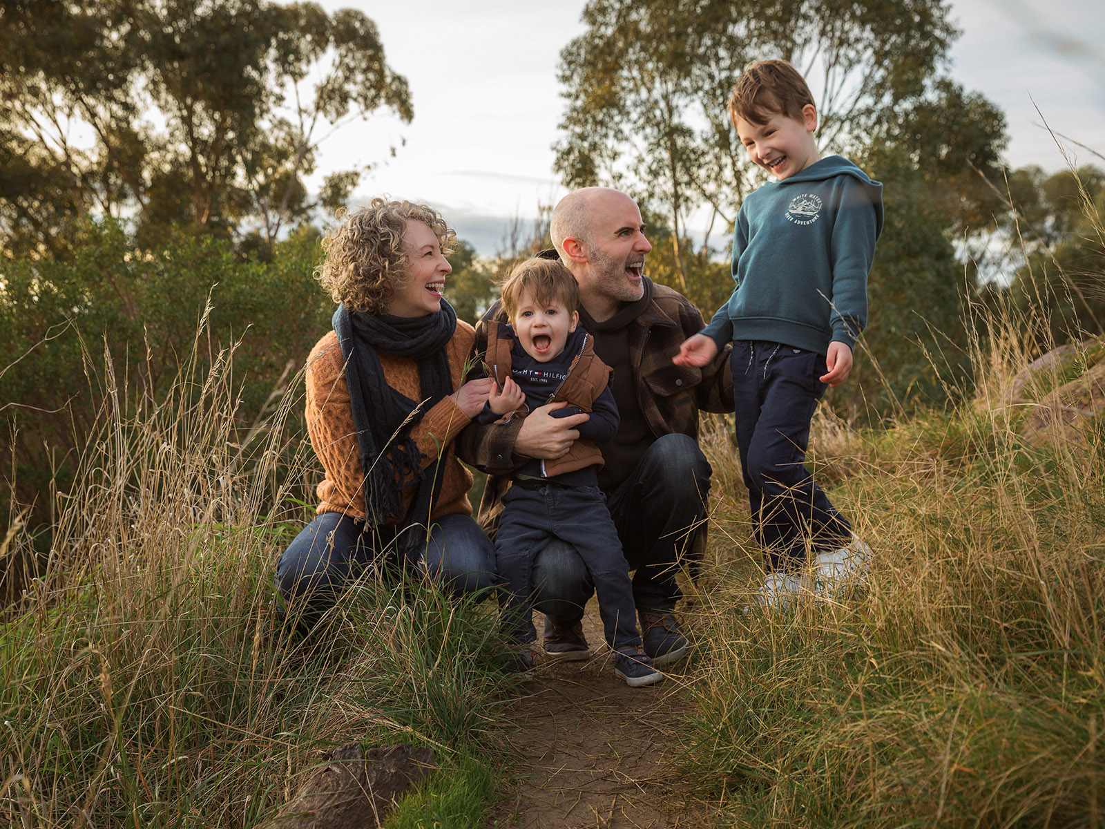Family with children photographed outdoors